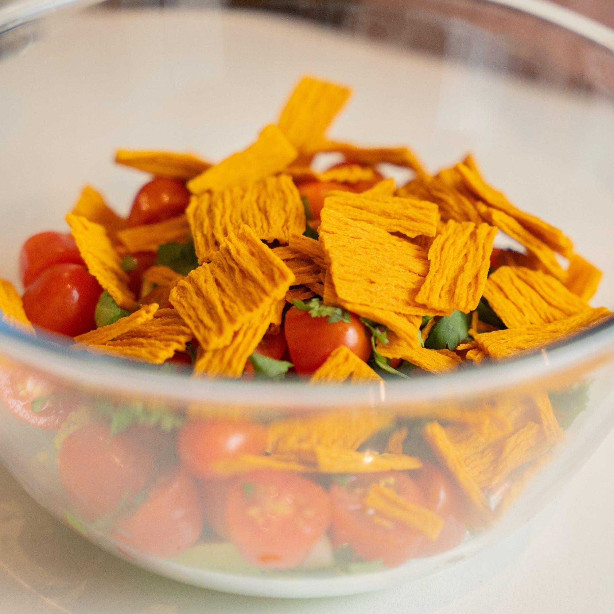 Mango, cucumber and tomato salad in a bowl